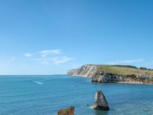 Preview wallpaper rocks, sea, boats, landscape, sky