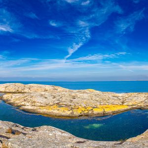Preview wallpaper rocks, sea, clouds, sky, sweden