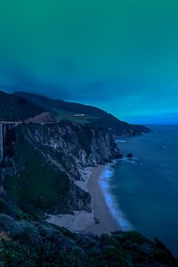 Preview wallpaper rocks, sea, coast, beach, dusk