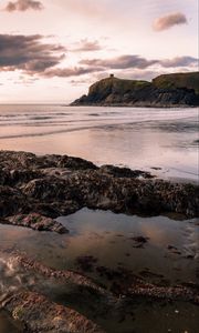 Preview wallpaper rocks, sea, coast, building, cliff