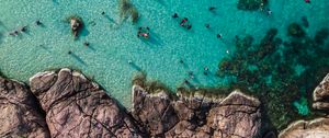 Preview wallpaper rocks, sea, coast, aerial view, people