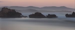 Preview wallpaper rocks, sea, fog, hills, landscape, dawn