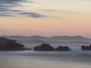 Preview wallpaper rocks, sea, fog, hills, landscape, dawn