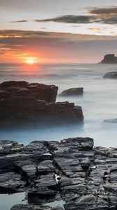 Preview wallpaper rocks, sea, fog, twilight, landscape, nature