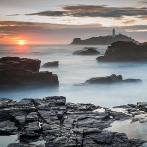 Preview wallpaper rocks, sea, fog, twilight, landscape, nature