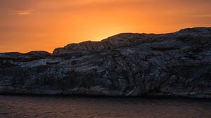 Preview wallpaper rocks, sea, glare, stones, sunset