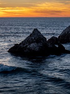 Preview wallpaper rocks, sea, horizon, landscape, nature, evening