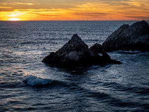 Preview wallpaper rocks, sea, horizon, landscape, nature, evening