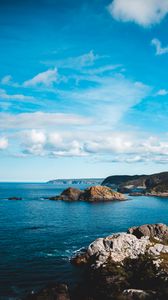 Preview wallpaper rocks, sea, horizon, clouds, sky