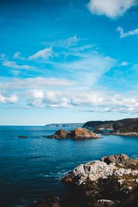 Preview wallpaper rocks, sea, horizon, clouds, sky
