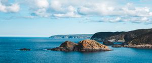 Preview wallpaper rocks, sea, horizon, clouds, sky