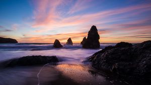 Preview wallpaper rocks, sea, ocean, sunset