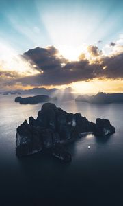 Preview wallpaper rocks, sea, rays, distance