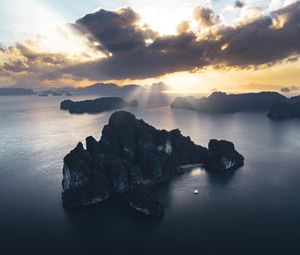 Preview wallpaper rocks, sea, rays, distance