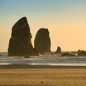 Preview wallpaper rocks, sea, sand, sky, nature