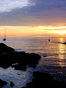 Preview wallpaper rocks, sea, ships, silhouettes, twilight