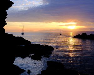 Preview wallpaper rocks, sea, ships, silhouettes, twilight