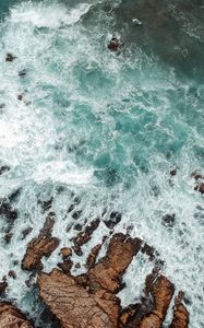 Preview wallpaper rocks, sea, stones, foam, aerial view