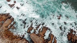 Preview wallpaper rocks, sea, stones, foam, aerial view