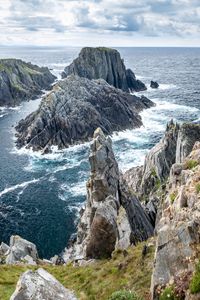 Preview wallpaper rocks, sea, stones, foam, waves, landscape