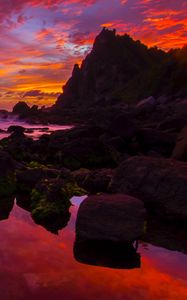 Preview wallpaper rocks, sea, sunset