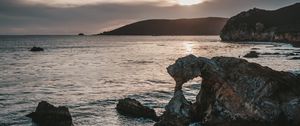 Preview wallpaper rocks, sea, sunset, sky, horizon