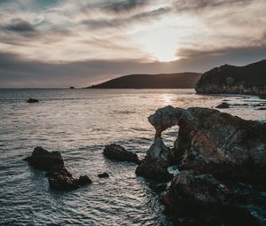 Preview wallpaper rocks, sea, sunset, sky, horizon