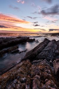 Preview wallpaper rocks, sea, sunset, stone, horizon