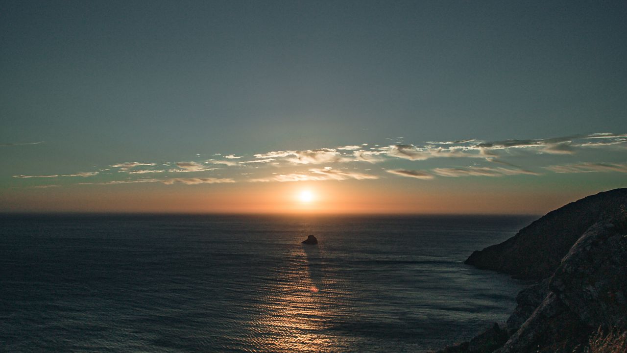 Wallpaper rocks, sea, sunset, sun, slope, grass