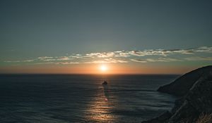 Preview wallpaper rocks, sea, sunset, sun, slope, grass