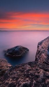 Preview wallpaper rocks, sea, sunset, sky, horizon, evening