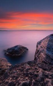 Preview wallpaper rocks, sea, sunset, sky, horizon, evening