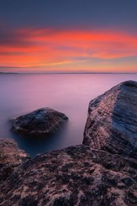 Preview wallpaper rocks, sea, sunset, sky, horizon, evening