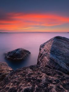 Preview wallpaper rocks, sea, sunset, sky, horizon, evening
