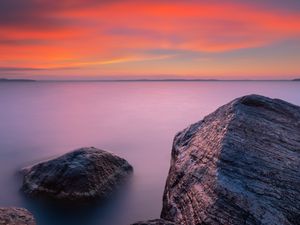 Preview wallpaper rocks, sea, sunset, sky, horizon, evening