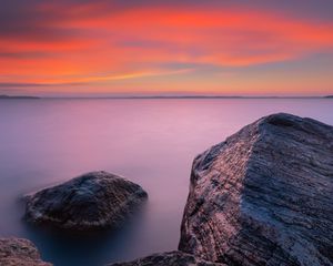 Preview wallpaper rocks, sea, sunset, sky, horizon, evening