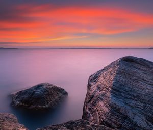 Preview wallpaper rocks, sea, sunset, sky, horizon, evening
