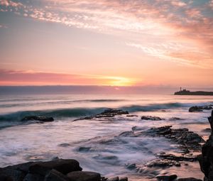 Preview wallpaper rocks, sea, sunset, horizon, clouds