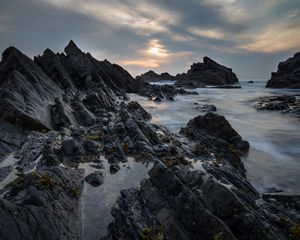 Preview wallpaper rocks, sea, sunset, coast, landscape
