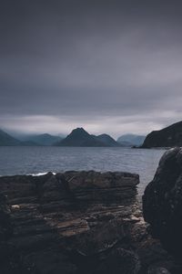 Preview wallpaper rocks, sea, twilight, dark