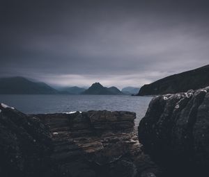 Preview wallpaper rocks, sea, twilight, dark
