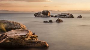 Preview wallpaper rocks, sea, water, twilight, landscape