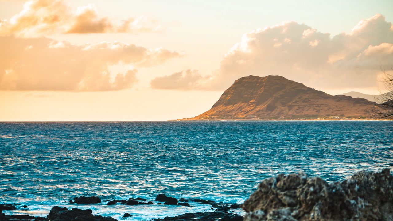 Wallpaper rocks, sea, waves, sky