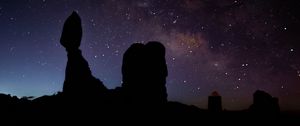 Preview wallpaper rocks, silhouettes, starry sky, night, dark, darkness