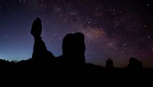 Preview wallpaper rocks, silhouettes, starry sky, night, dark, darkness