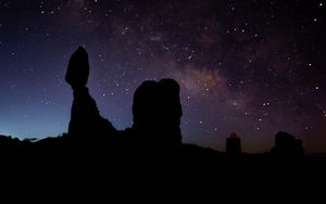 Preview wallpaper rocks, silhouettes, starry sky, night, dark, darkness