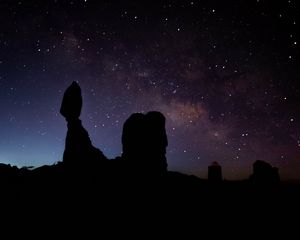 Preview wallpaper rocks, silhouettes, starry sky, night, dark, darkness