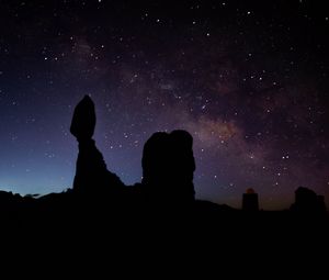 Preview wallpaper rocks, silhouettes, starry sky, night, dark, darkness