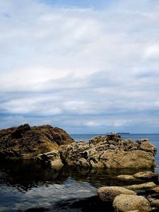 Preview wallpaper rocks, sky, sea, beautifully