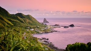 Preview wallpaper rocks, slope, coast, grass, sunset